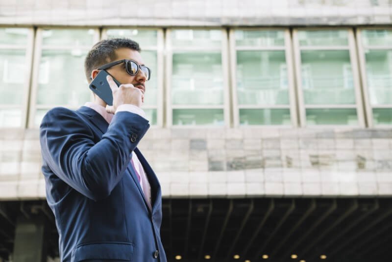 Business Client making a call for a limousine service